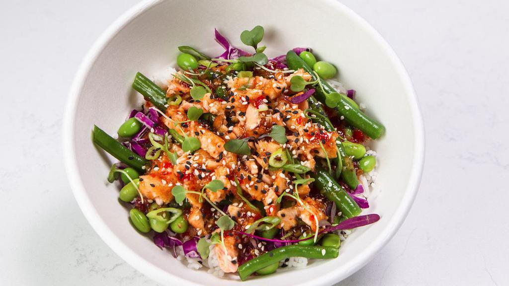 Sweet & Spicy Salmon Bowl · Edamame, purple cabbage, broccoli, hericot vert, sesame seeds, sweet chili. All bowls served with a choice of jasmine rice or brown rice.