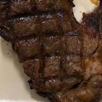 24 Karat Ribeye Steak Dinner · well seasoned juicy USDA select top  10 oz Ribeye steak served with vegetables and a side of...