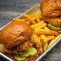Kid'S Chicken Sliders · 2 mini sliders with pickles. Choice of side fries, broccoli, or mashed.