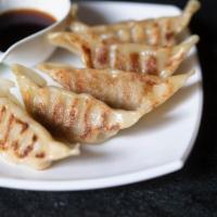Gyoza · 6 deep fried or pan fried pork dumplings