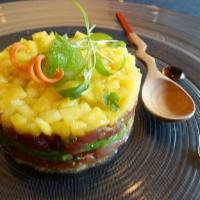 Tuna Tar Tar · cubed tuna with chives, fried onion, avocado, soy sauce, sesame oil topped with mango, wasab...