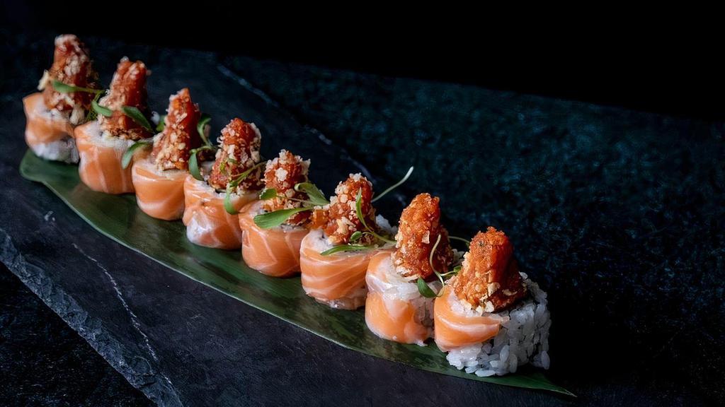 Samurai Roll · inside: yellowtail, scallion, and avocado outside: salmon, spicy tuna, micro greens, and tempura flakes
