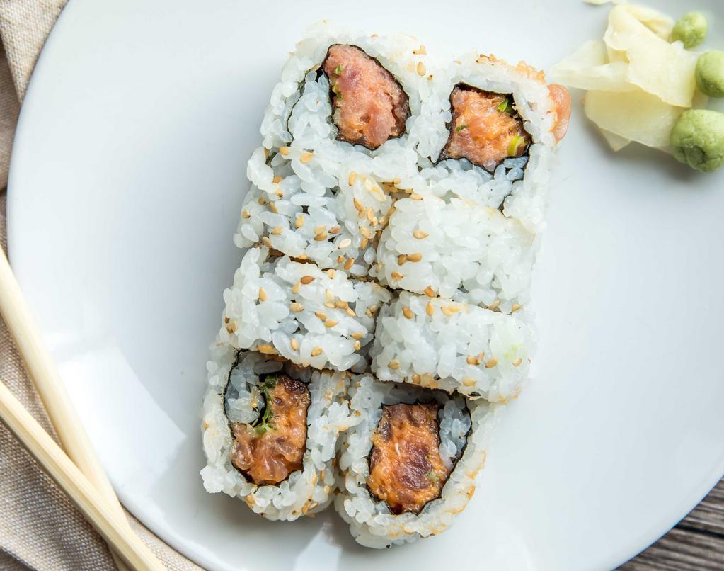 Spicy Tuna Roll · inside: minced tuna and scallion with spicy aioli outside: sesame seeds