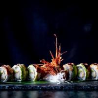 Dragon Roll · inside: amaebi tempura and avocado outside: eel, avocado, dressed with spicy aioli and eel s...