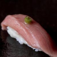 Toro (Heavily Marbled Tuna) Nigiri · on top of sushi rice