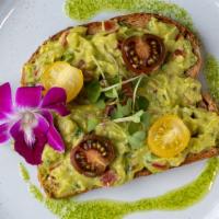 Avocado Toast · Whole wheat bread, cherry tomatoes, mixed peppers, microgreens.