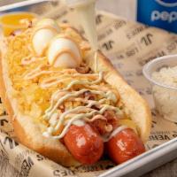 Verde Perro Doble · Super double hot dog. Served with mozzarella cheese, bacon, smashed potato chips and quail e...
