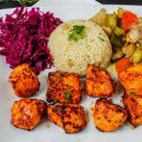 Chicken Kebab · Chicken breast cubes, white rice, red cabbage, sautéed vegetables.