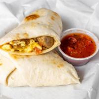 Breakfast Burrito · Choice of bacon or sausage in a tortilla wrapped with scrambled eggs, crispy potatoes, sauté...