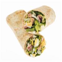 Grilled Chicken Caesar Wrap · Our Grilled Chicken Caesar wrap on a flour tortilla comes recommended with a base of Romaine...