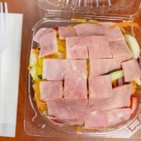 Small Chef Salad · Ham turkey iceberg lettuce tomato cucumber carrot banana pepper and cheese and red onion.