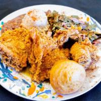 Fried Chicken · Three pieces of springer mountain farms chicken served with two sides.