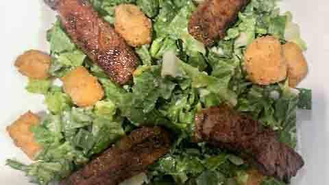Caesar Salad · Romaine lettuce, parmesan cheese, mesa corn croutons, caesar dressing.