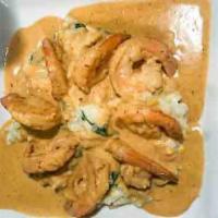 Camarones Pueblo · Shrimp, chipotle sauce, corn relish, creamy spinach risotto.