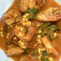 Chipotle-Lime Butterfly Shrimp · Shrimp, white wine, lime, roasted red pepper sauce, Jalapeno corn and mexican grit cake.