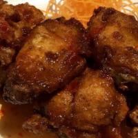 Sweet Chili Wings · Five. Deep fried marinated chicken wings tossed in sweet chili sauce.