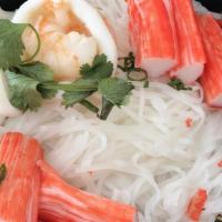 Tom Yum Noodle · Fresh rice noodle, shrimp, imitation crab, and squid, bean sprouts, scallions, and cilantro ...