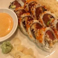 Kama Kase Roll · Tuna, tempura flakes, avocado, spicy mayonnaise, inside out with masago and sesame seeds.