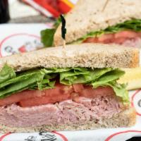 Ham Sandwich · A classic. Made-to-order on your choice of bread, served with lettuce and tomato, Groucho's ...