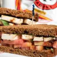 Caprese Sandwich · Sliced tomato and fresh Mozzarella layered with basil leaves and balsamic glaze drizzle perf...