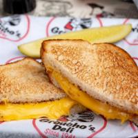 Toasted Cheese · A childhood favorite served with groucho's famous potato chips and a pickle spear.
