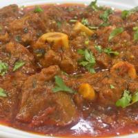 19 Lamb Curry · Lamb meat cooked slowly with tomato, onion, ginger, garlic, and Indian spice come with side ...