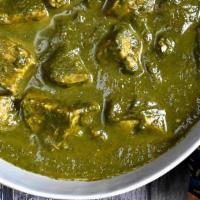 17 Palak Chicken · Tender morsels of chicken cooked in a tasty spinach. come with side of basmati rice.