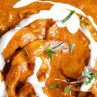 29 Shrimp Tikka Masala · Marinated shrimp cooked with cream, ginger, garlic, tomato, onion, and Indian spice. come wi...