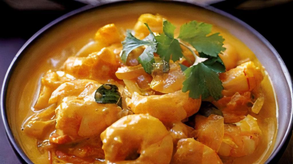 28 Shrimp Korma · Shrimps cooked in flavorful creamy sauce with tomato, onion and Indian spice. come with side of rice.