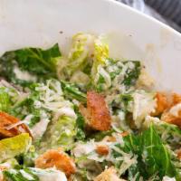 Caesar Salad · Green salad with Caesar dressing and cheese.