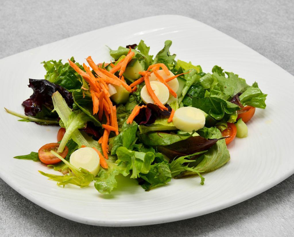 The Palm Mixed Green Salad · Romaine, iceberg, baby greens, radish, scallions, cherry tomatoes, carrots, tossed in garlic vinaigrette.