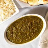 Palak Paneer · Gluten-free. Delicately flavored spinach cooked with fresh homemade Cottage cheese garnished...