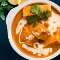 Creamy Paneer Butter Masala · Rich and creamy curry made with paneer, spices, onions, tomatoes and cashews.