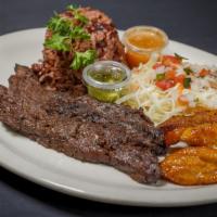 Carne Asada Completa · Popular. Charbroiled homemade steak with unique seasoning. With gallo pinto, maduros, and sa...
