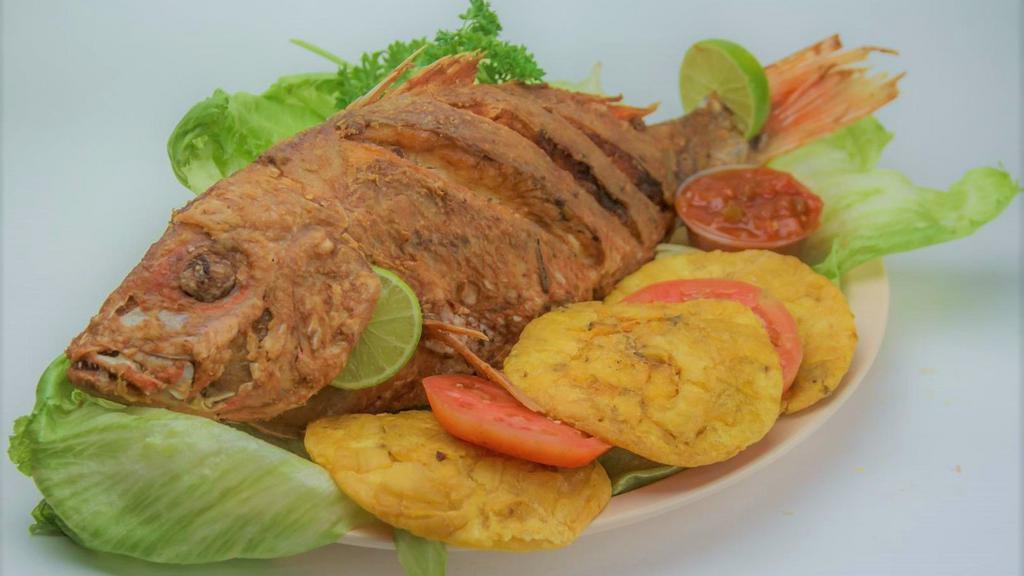 Creole Whole Fish Pargo A La Tipitapa · Large Grilled fish filet. Whole fish Pargo with white rice , tostones or maduros, and Col salad. please call before ordering  for availability check.