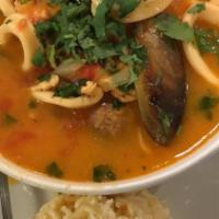 Mariscada · Delicious seafood soup. Clams, mussels, calamari, langoustine, shrimp, scallops, half filet ...