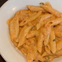 Pasta With Vodka Sauce · Penne alla vodka is a pasta dish made with vodka and penne pasta, usually made with heavy cr...