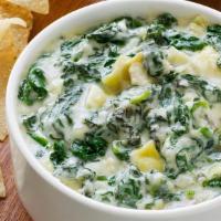 Artichoke And Spinach Dip · Creamy spinach and artichoke dip served with corn tortilla chips.