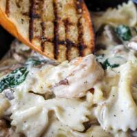 Shrimp Alfredo Pasta · Pasta made with grilled shrimp, spinach and alfredo sauce.