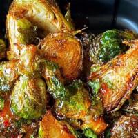Fried Brussel Sprouts · Brussel sprouts fried then tossed in a sweet chili sauce.
