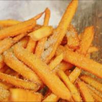 Sweet Potato Fries · Sweet potato fries fried then sprinkled with cinnamon sugar.