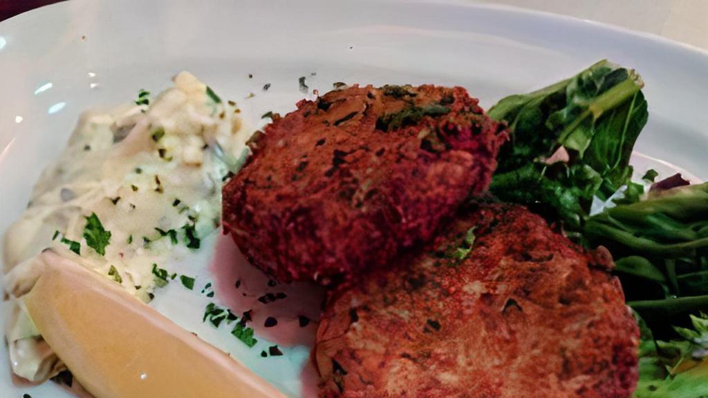 Crab Cakes · Breaded, pan-seared, served with artichoke-basil tartar sauce.