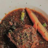 Beef Short Rib · Boneless, braised with tamarind au jus, served with broccoli, broccoli  & carrots.