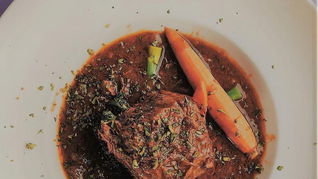 Beef Short Rib · Boneless, braised with tamarind au jus, served with broccoli, broccoli  & carrots.