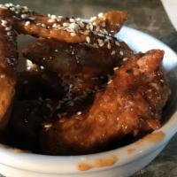 Sweet Chili Wings · Scallions, sesame seeds.