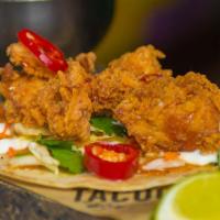 Crispy Chicken · Spicy. Southern fried chicken, spicy slaw, crema, pickled jalapeños, mike’s hot honey.