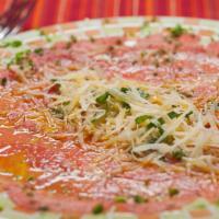 Carpaccio Di Manzo* · Best Seller. Slices of filet mignon with olive oil, lemon and parmesan, ”Best in the world”