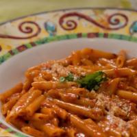 Penne Vodka · Best Seller. Pasta with crispy shallots, creamy pink sauce and a touch of vodka