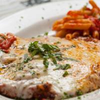 Veal Parmigiana · Best Seller. Breaded veal, baked and topped with marinara and mozzarella
