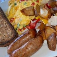 The House Breakfast · Two eggs, home fries, whole wheat toast and choice of sausage, Canadian bacon, bacon, ham or...